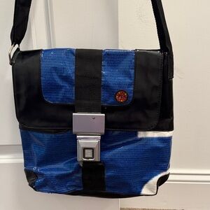 Vy & Elle recycled billboard material seatbelt crossbody bag purse